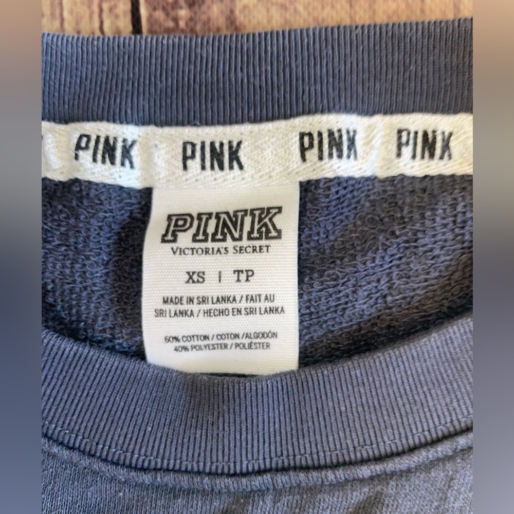 Pink long sleeve shirt.